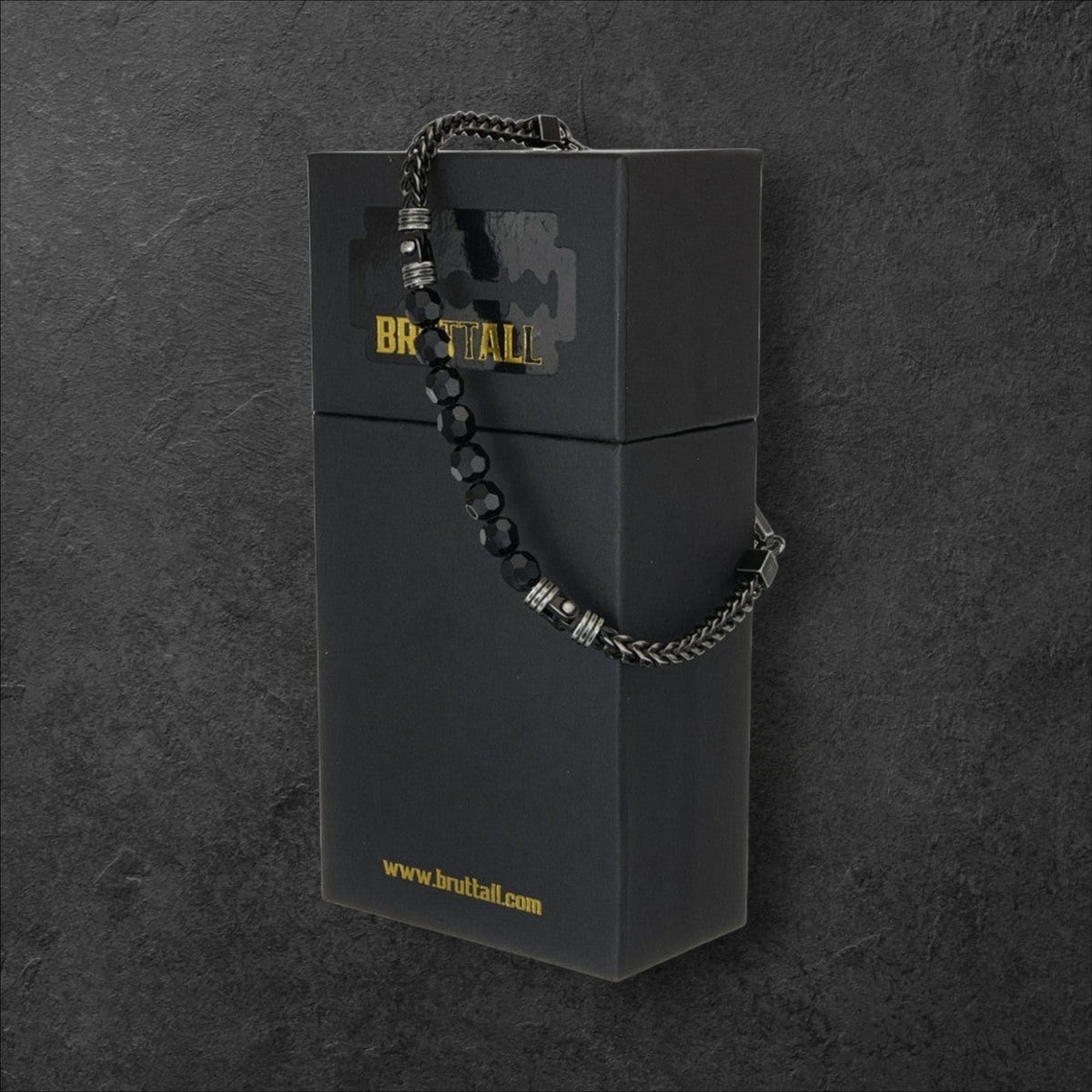 Bruttall CORE bracelet featuring a dark chain, faceted black Swarovski crystals, and antique black metal accents.