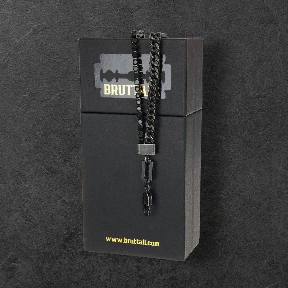 Bruttall GATE necklace featuring an antique black Cuban chain and black Swarovski crystals on a branded display box.