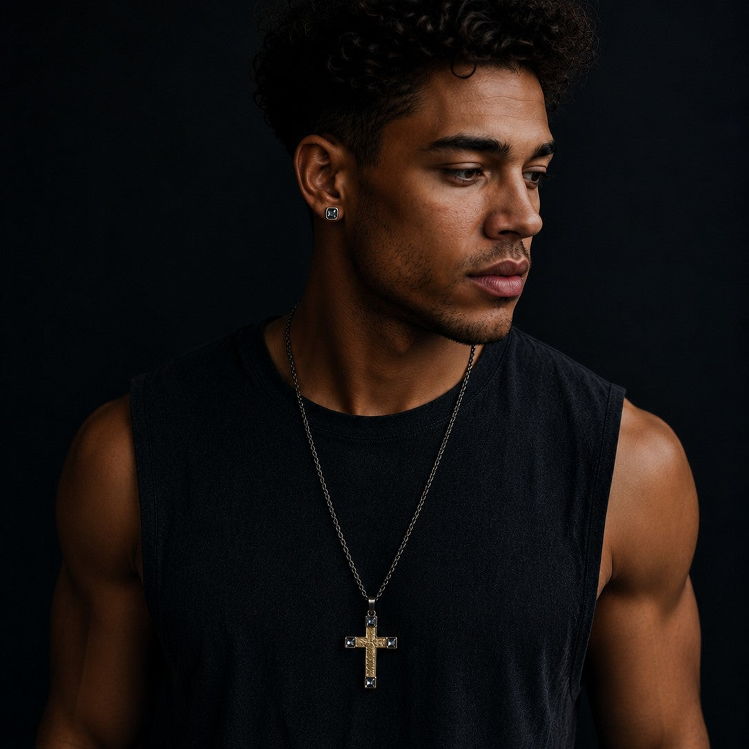 Bruttall OCTANT cross pendant necklace in antique black and gold with Swarovski crystals worn by a man