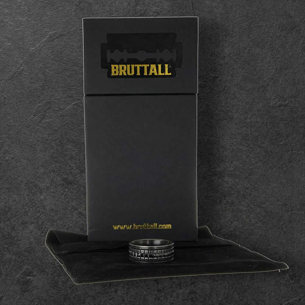 Bruttall GATE ring in antique black featuring a textured band with embedded black Swarovski crystals