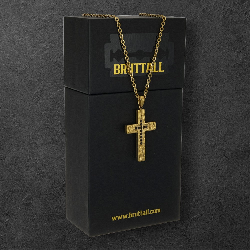 Bruttall gold matt cross pendant necklace with black Swarovski Zirconia accents on a black branded gift box