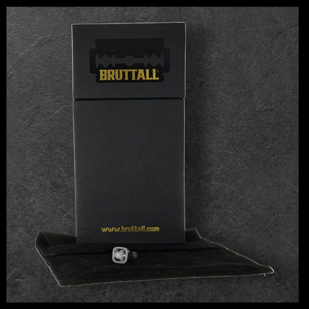 Bruttall OCTANT small single earring with Swarovski crystal in antique plating, displayed on a black branded box.